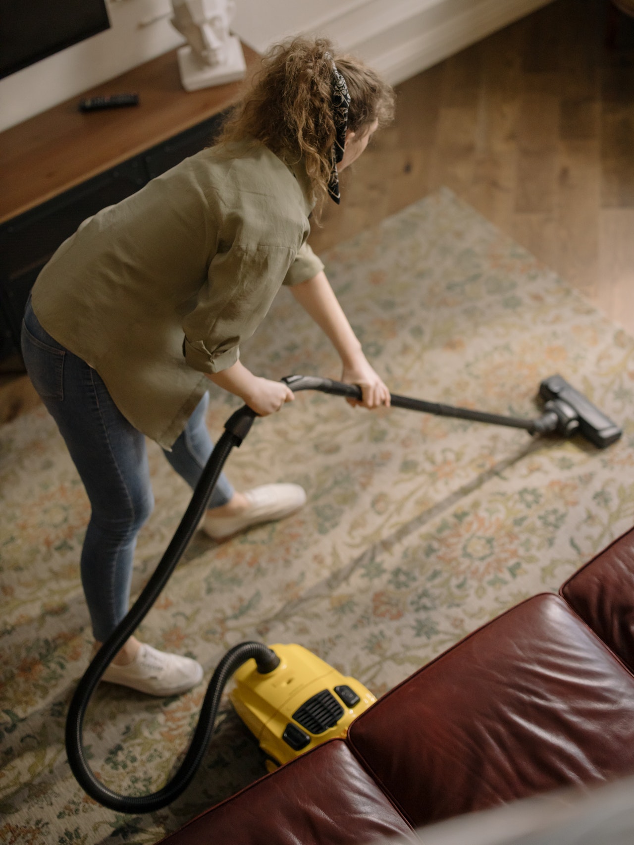 woman vacuuming her living room