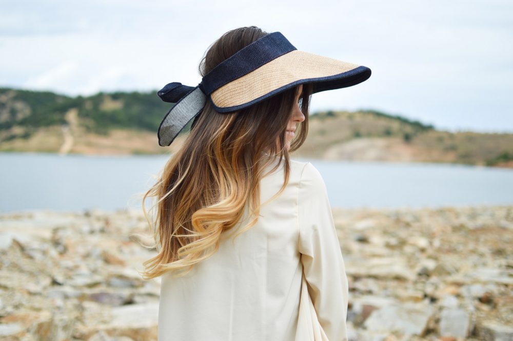 Woman in straw visor