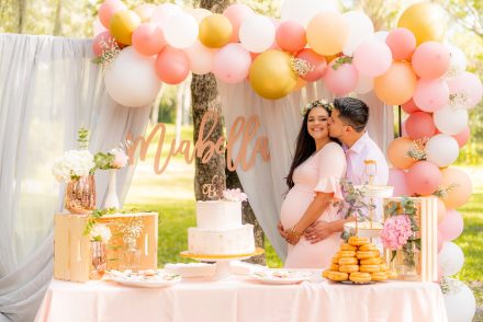 Man Kissing Pregnant Woman