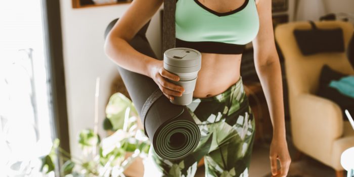 crop of woman about to leave to go to a yoga class