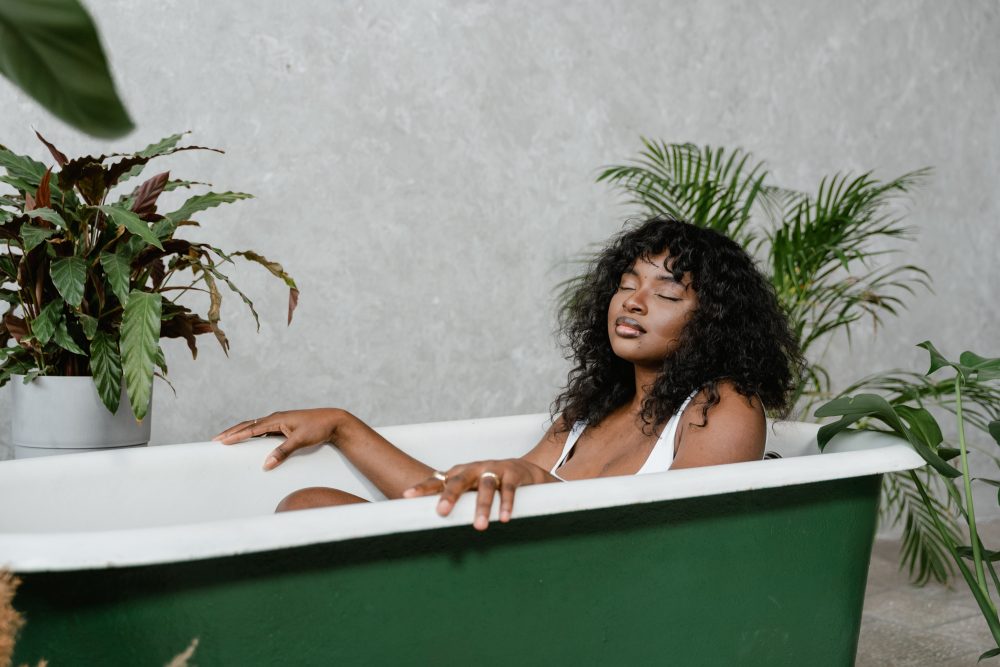 woman in green bathtub