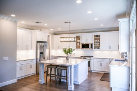 modern kitchen with vinyl wood flooring